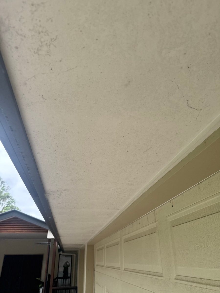 Rendered gable entry in Brisbane before Dript house washing
